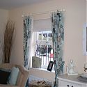 Hand finished curtains  with roman blinds