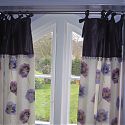 Trimmed tie top curtains